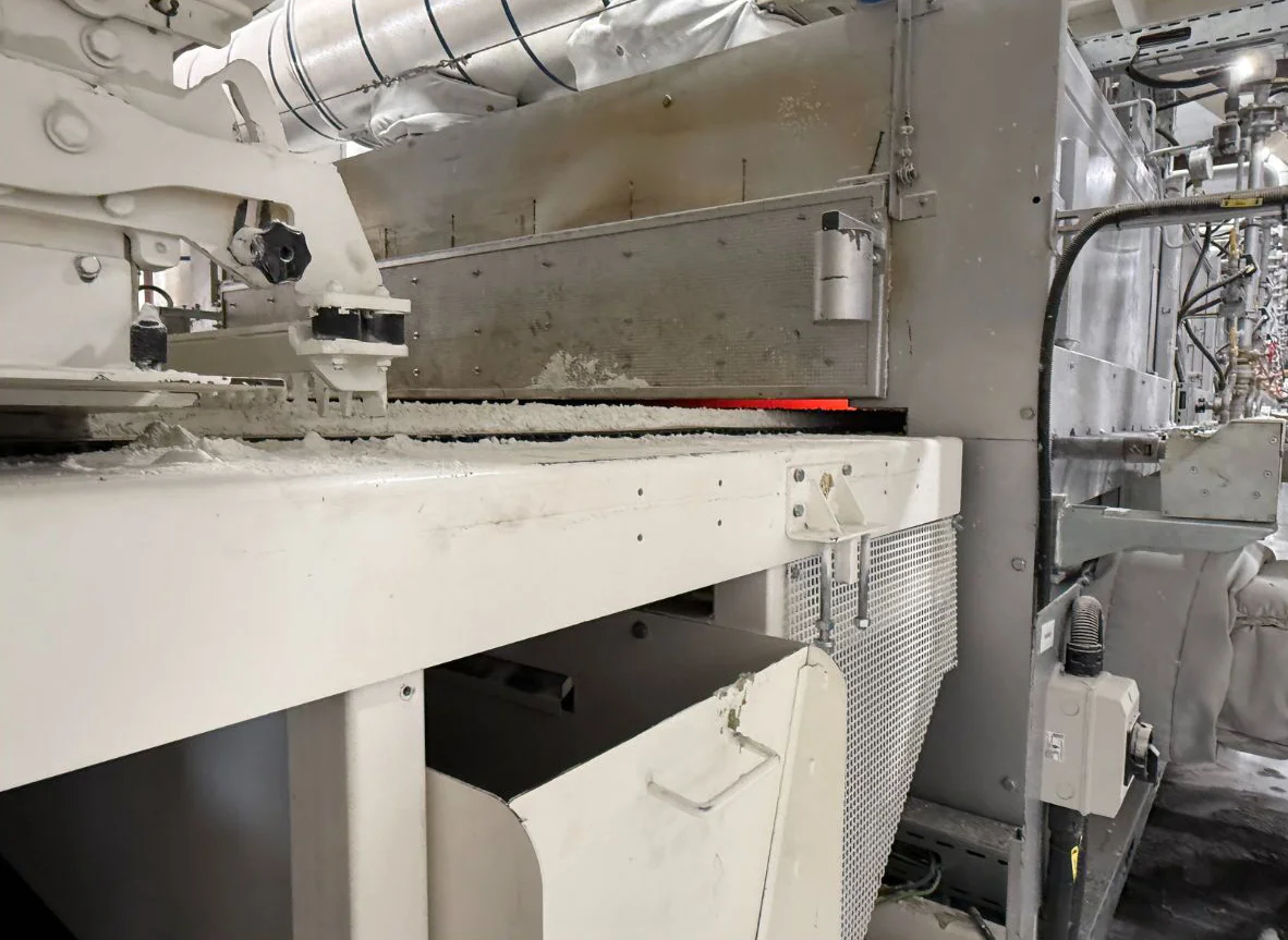 Foam glass aggregate emerging from the kiln at the ACE production facility